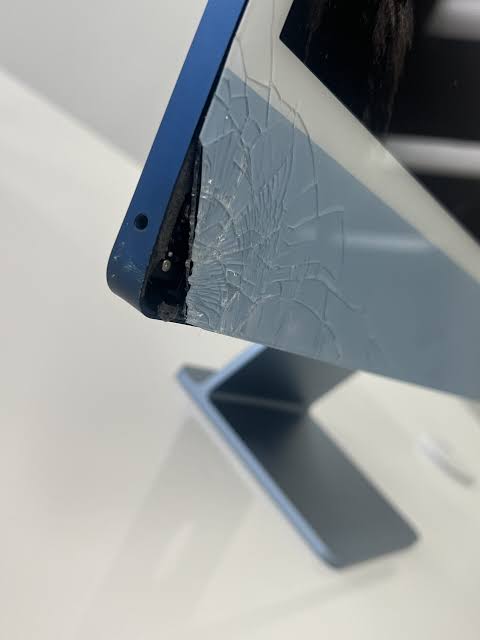 iMac 24 inch M1 Blue with cracked broken screen glass at The Mac Space repair shop in Marietta GA
