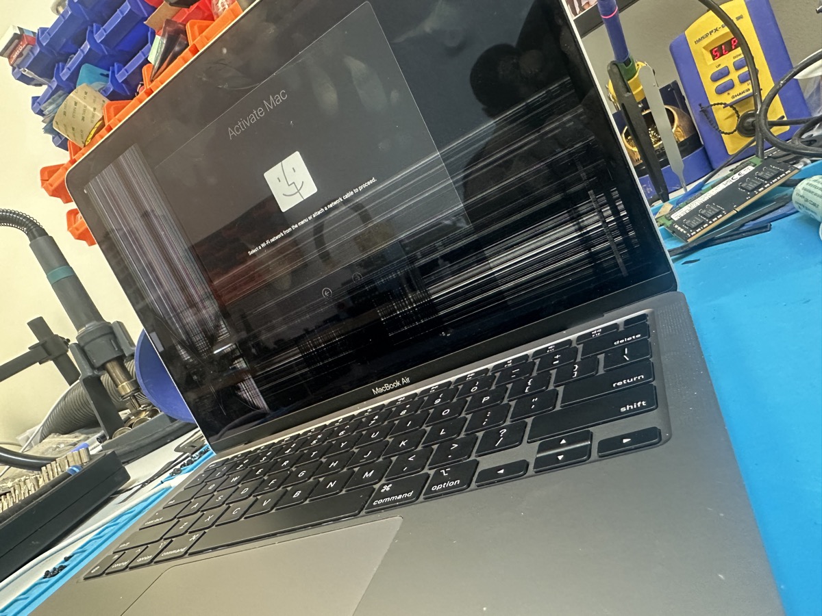 MacBook Air with shattered LCD screen before repair at The Mac Space